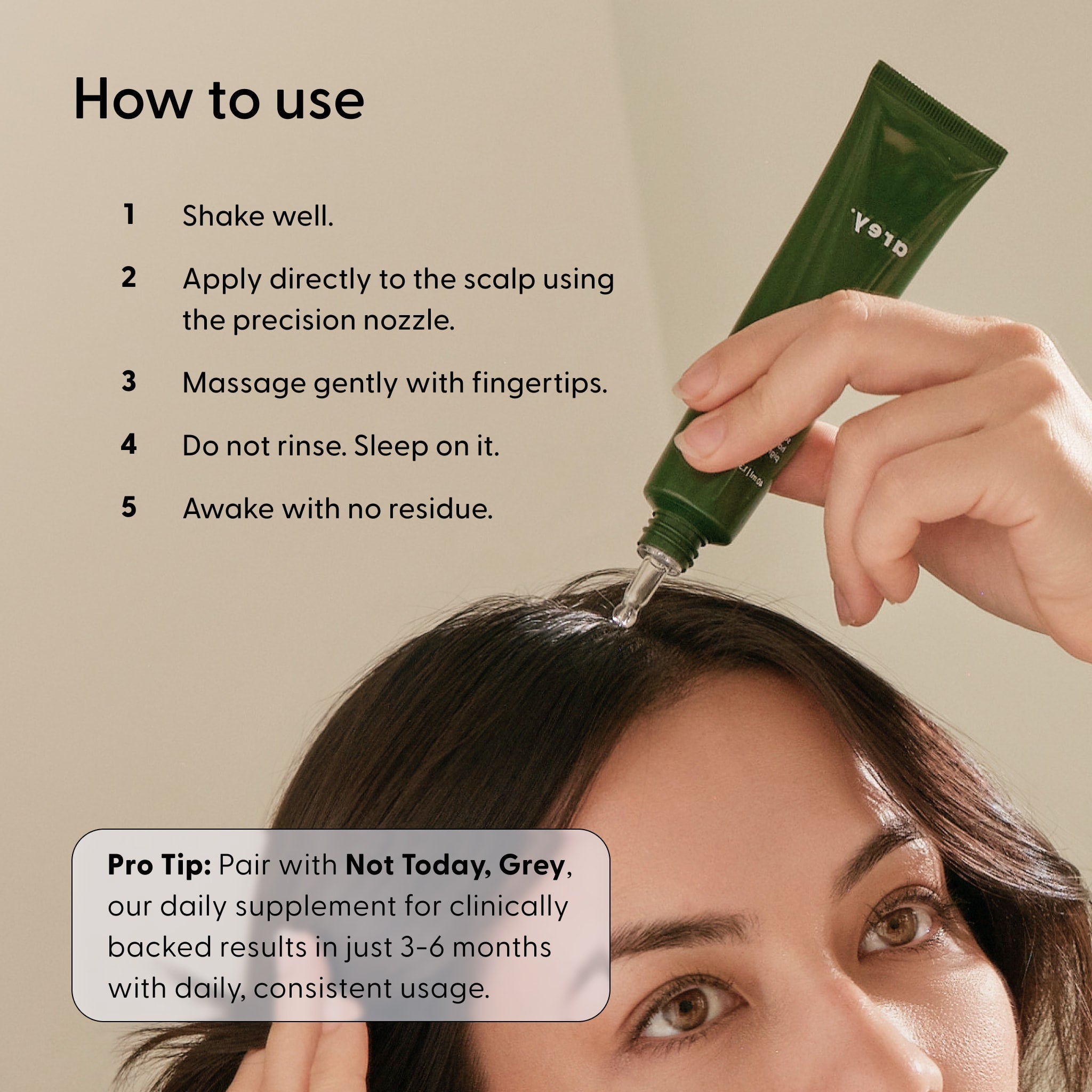 A person applies Arey’s Good Night, Grey® serum to their scalp using a precision nozzle. Step-by-step usage instructions appear beside them. A Pro Tip box suggests pairing it with a daily supplement or integrating it into an overnight scalp treatment for best results.