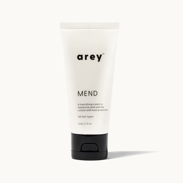 Cream tube labeled 'Mend' on a white background