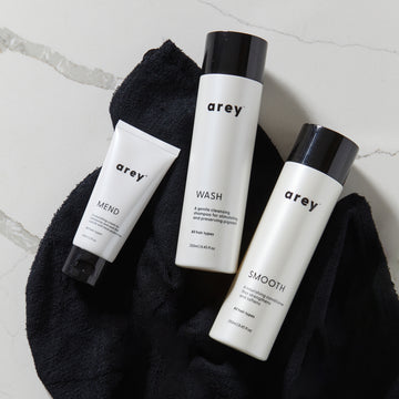 The care and repair set laying on the hair wrap on the floor