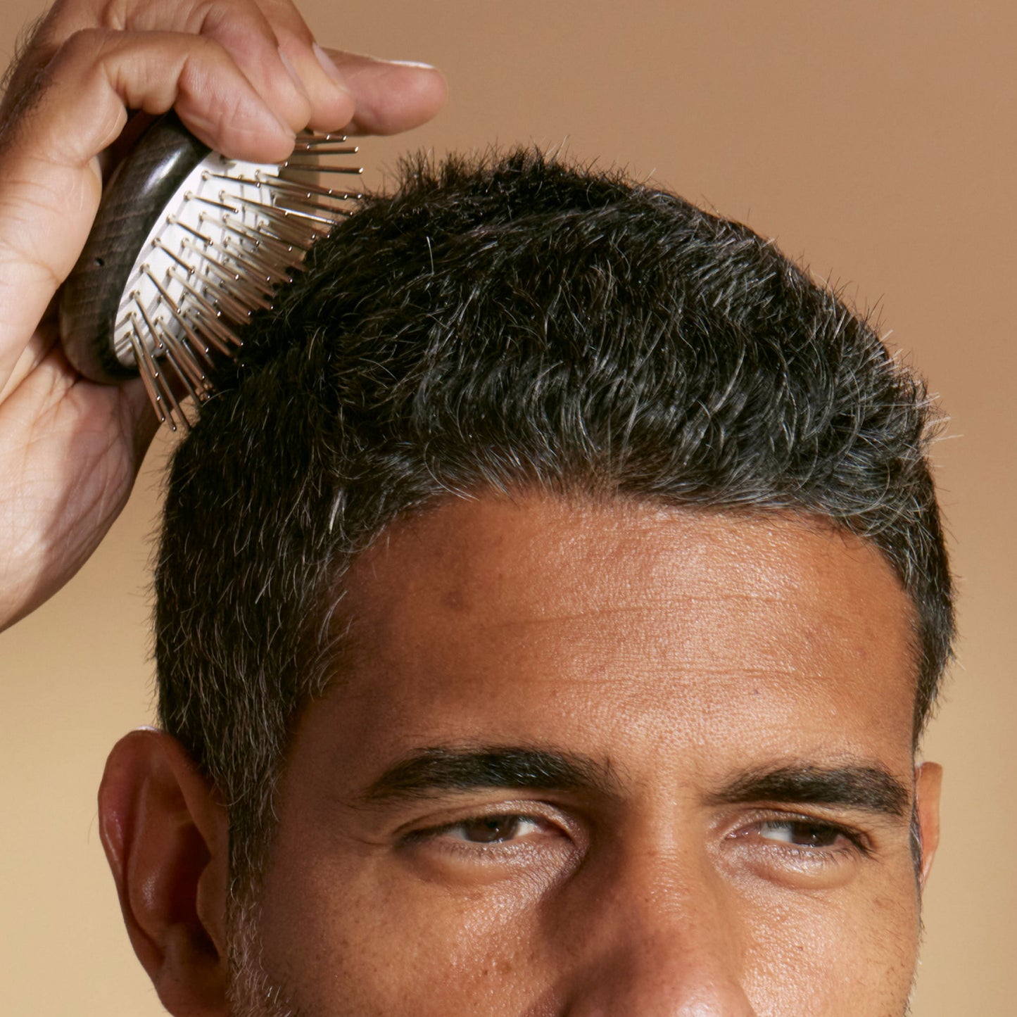 Scalp Brush in use