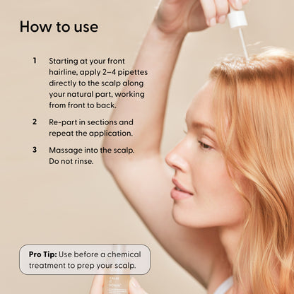 A woman applies Arey’s Calm It Down Scalp Serum to her scalp using a dropper, following detailed instructions on the left side of the image to soothe irritation and protect her scalp.