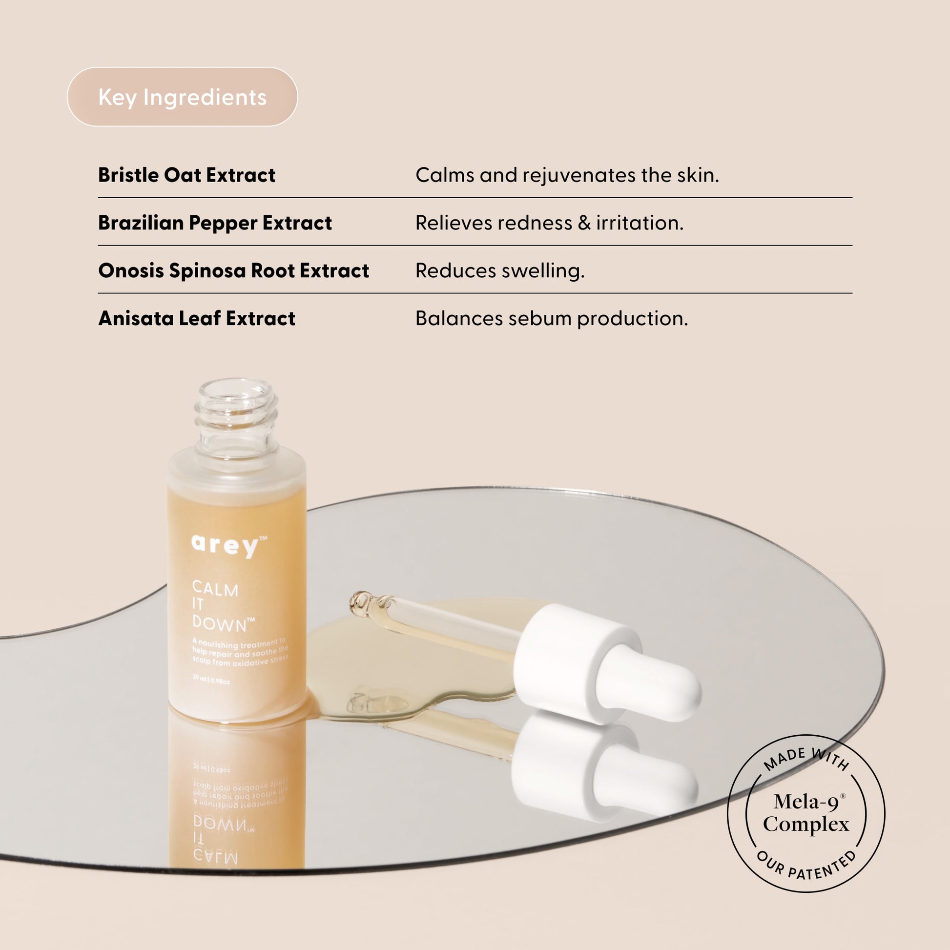 haircare product with key ingredients listed on a beige background