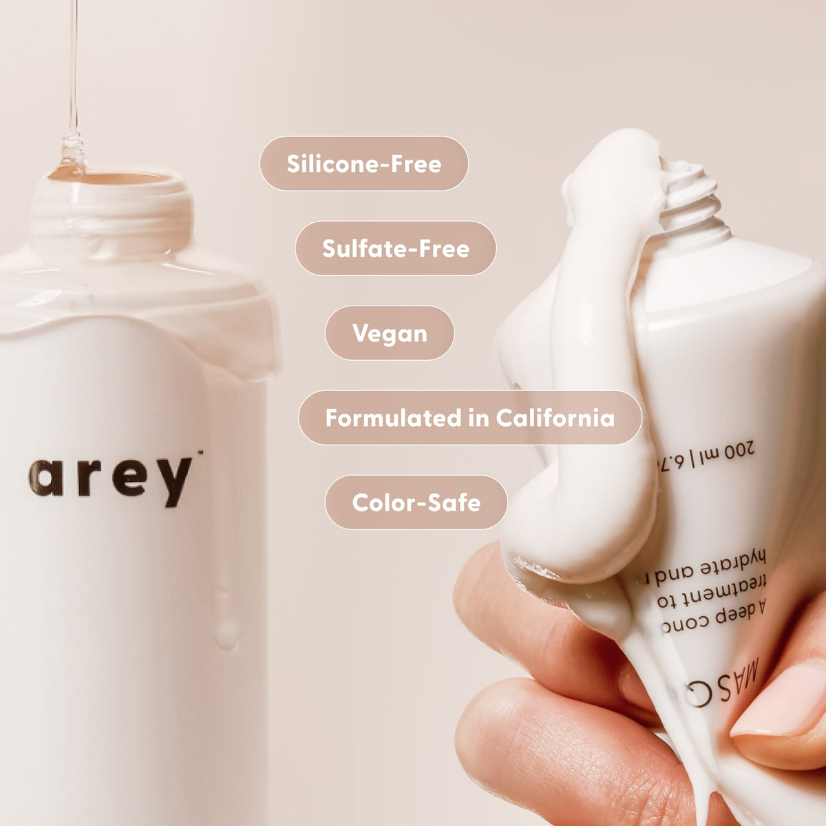 A minimal, neutral-toned scene shows a hand squeezing white cream from a tube beside a bottle labeled Arey—both part of The Deep Treatment Duo, designed to delay greys. Highlighted text notes the duo is silicone-free, sulfate-free, vegan, color-safe, and formulated in California.