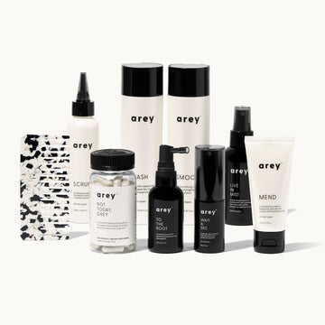 Collection of arey haircare products on a white background