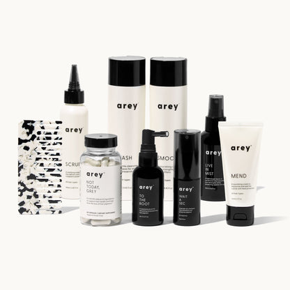 Collection of arey haircare products on a white background