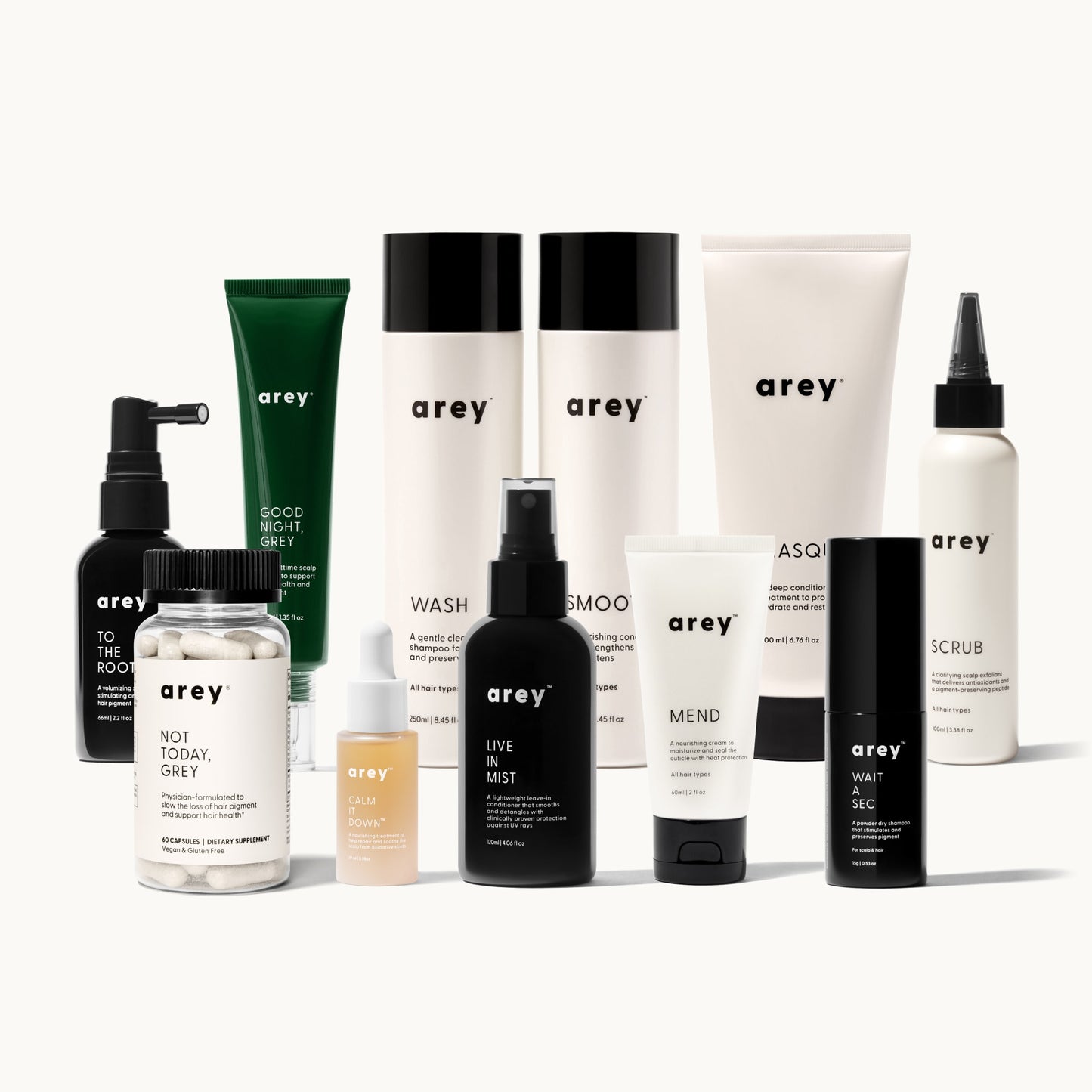 Lineup product photo of the complete Arey hair care collection including Good Night Grey, To The Root, Not Today Grey, Calm It Down, Wash, Smooth, Live In Mist, Mend, Wait A Sec, Masque, and Scrub on a white background