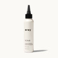 Arey Scalp Scrub bottle on cream background. Label reads: arey. SCRUB. A clarifying scalp exfoliant that delivers antioxidants and a pigment-preserving peptide. All hair types. 100ml / 3.38 fl oz.