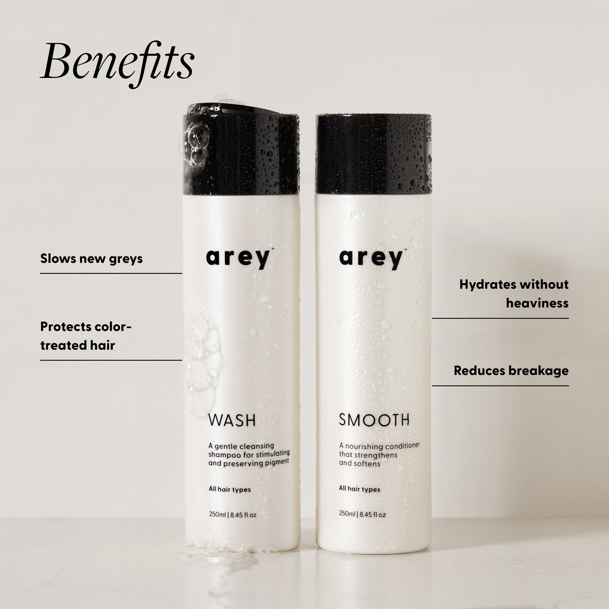Arey Wash and Smooth bottles with benefits: slows new greys, protects color-treated hair, hydrates without heaviness, reduces breakage.