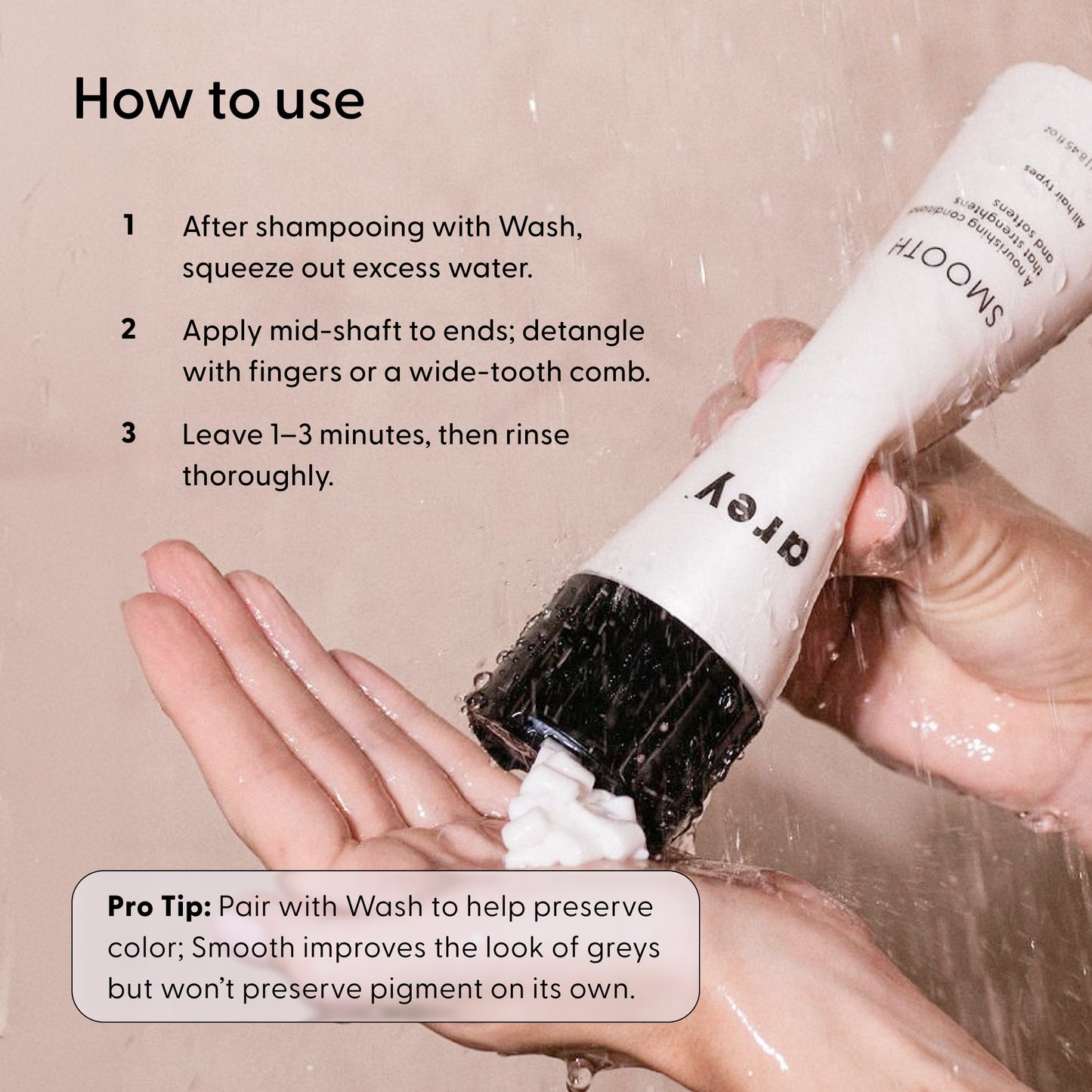 A person’s wet hands hold a bottle labeled Arey Smooth Conditioner, squeezing out the white, nourishing formula. The text offers usage instructions and a pro tip to pair Smooth Conditioner with Arey Wash for optimal color preservation.