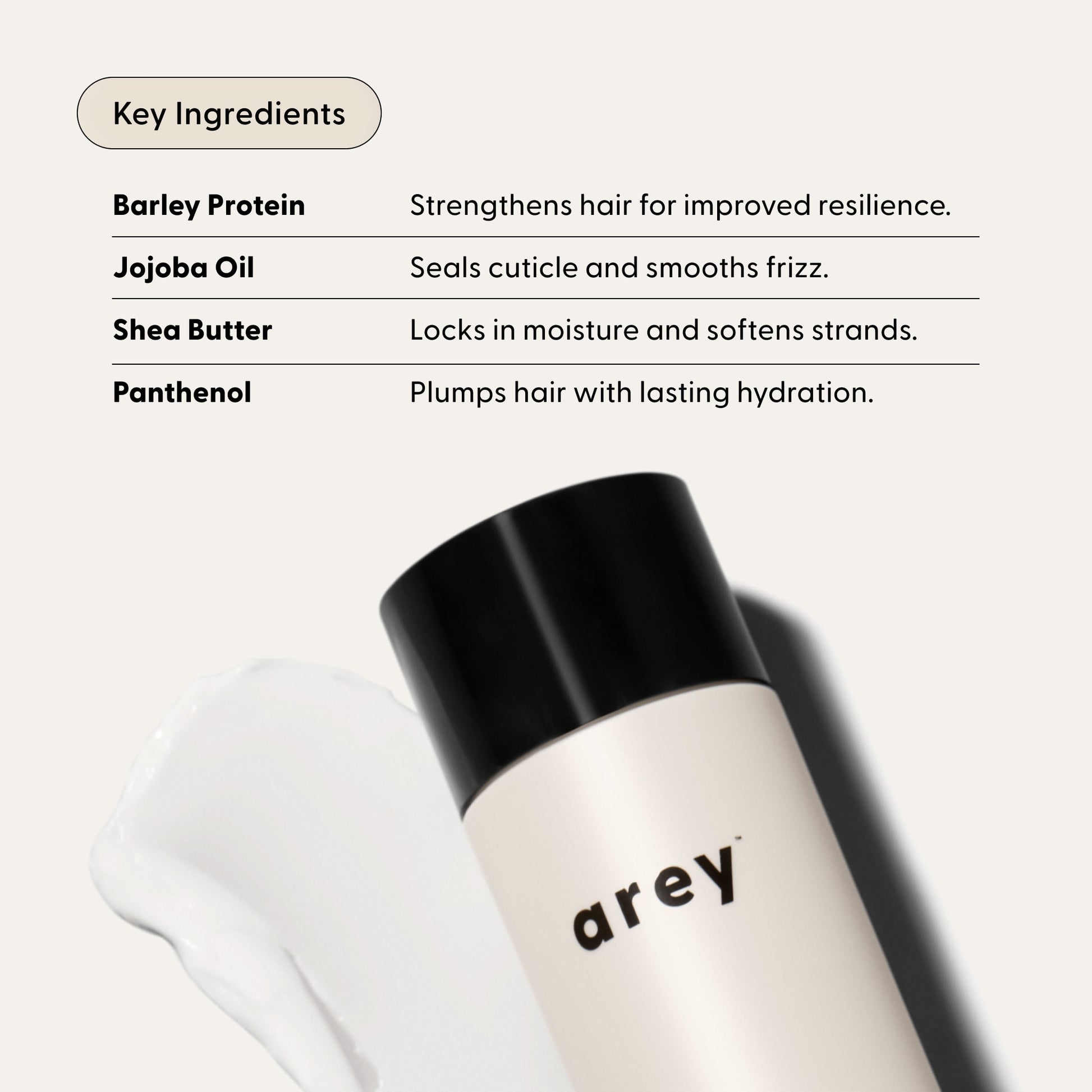 A bottle labeled Arey Smooth Conditioner lies next to a smear of cream. Text lists key ingredients—barley protein, jojoba oil, shea butter, and panthenol—and highlights their benefits for hair health and hydration. This nourishing conditioner from Arey uses a clean formula to leave your hair feeling smoother, healthier, and deeply hydrated.
