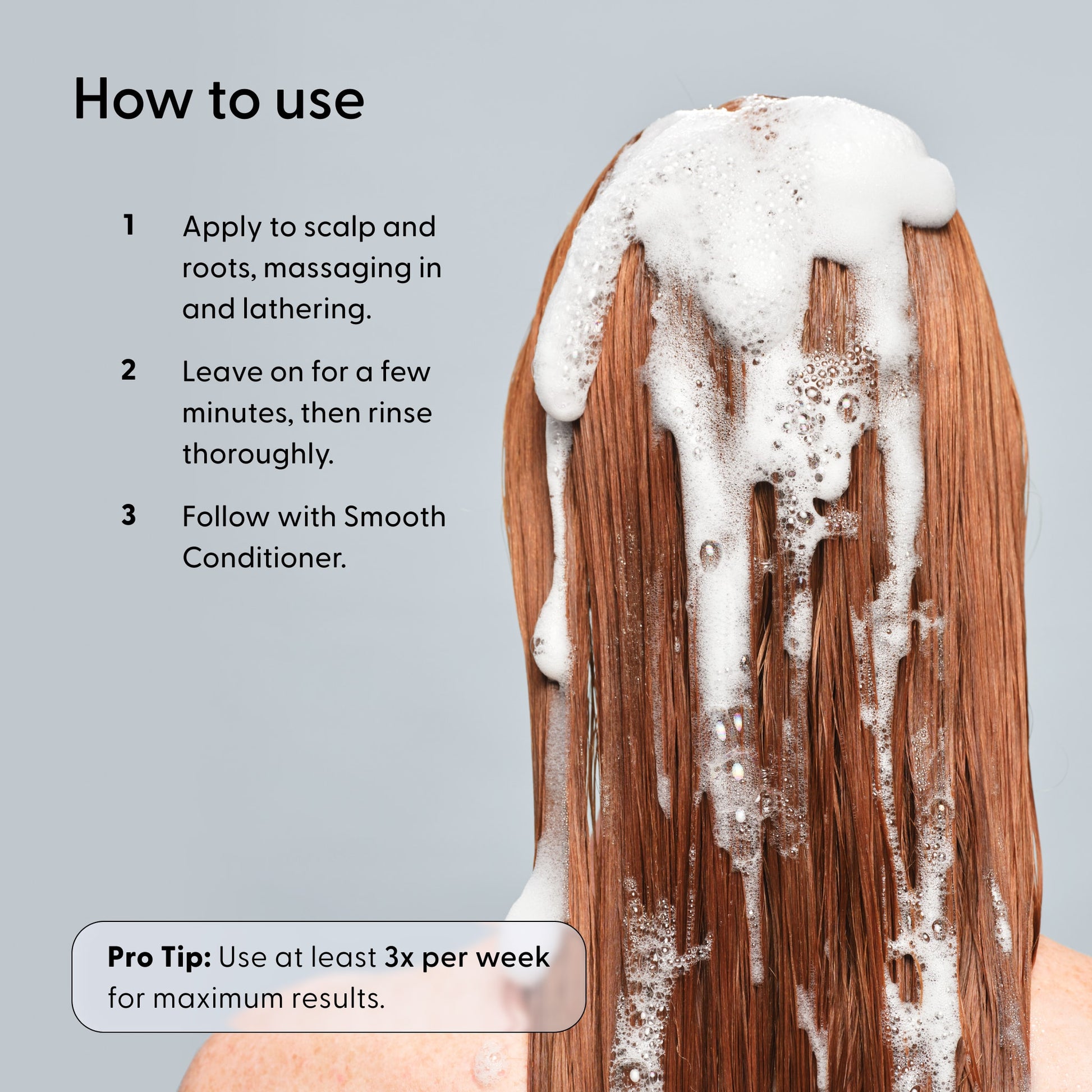 A person with long, wet hair has Wash Shampoo from Arey lathered on their head and back. Instructions on the left explain how to use the product, while a tip suggests using this anti-aging shampoo at least three times per week.