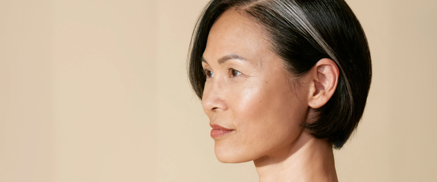 Model with grey-streaked bob — take the long view CTA